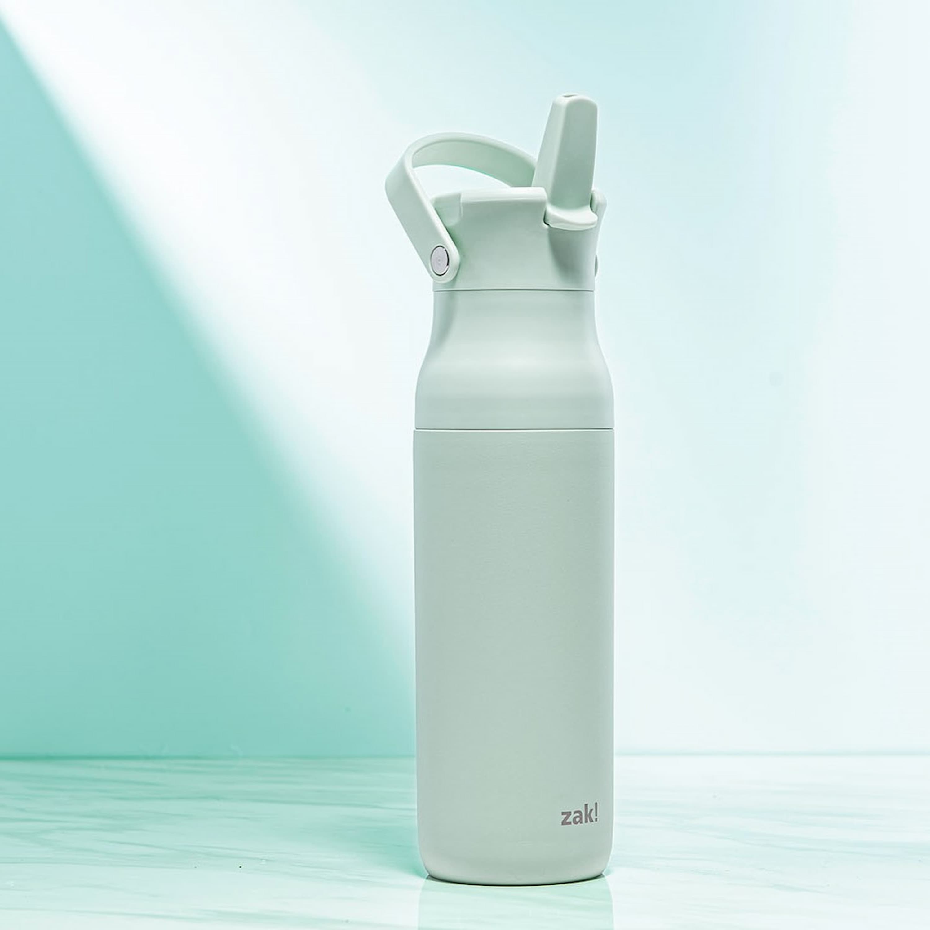 Light green water bottle with light green bright background