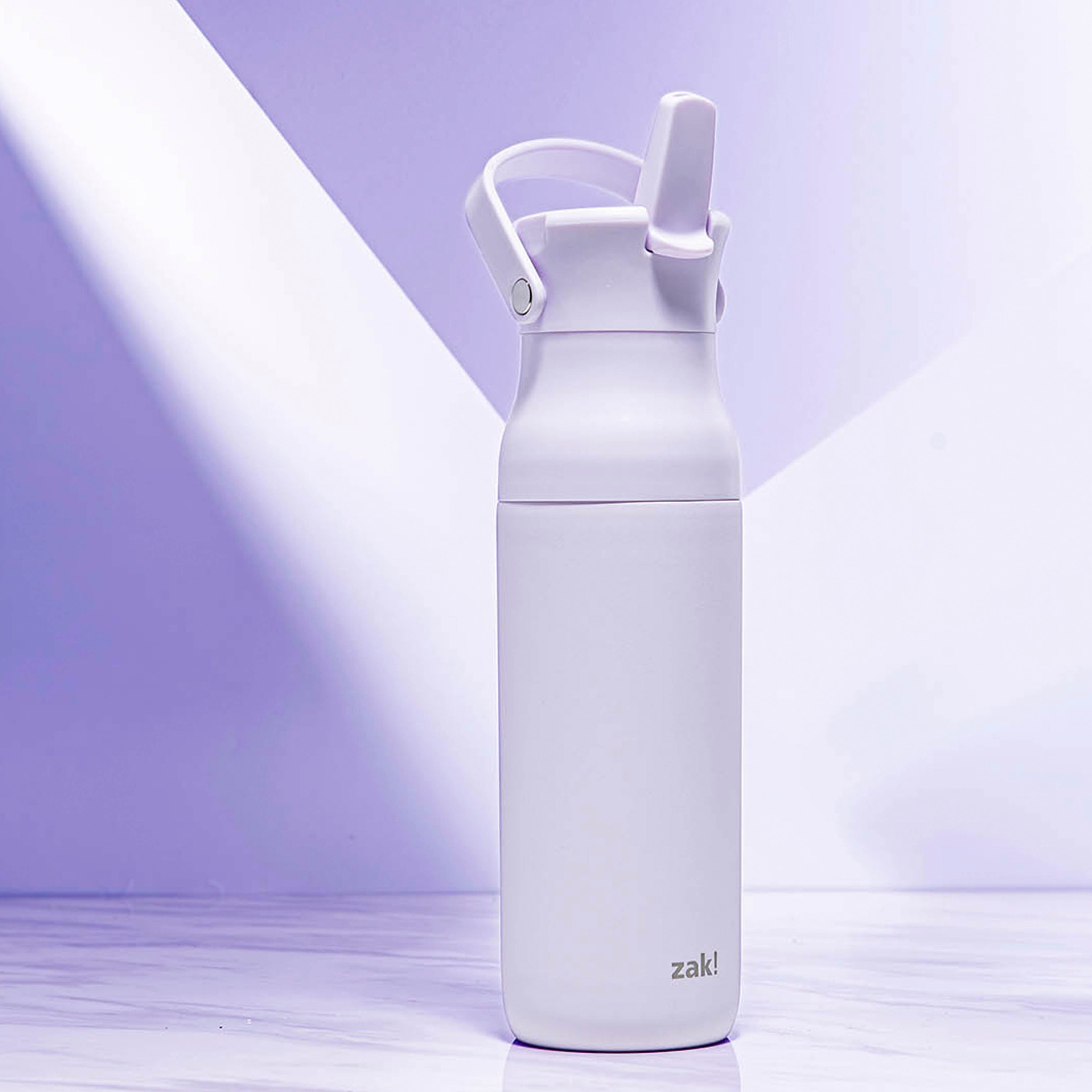 Purple water bottle with a straw lid on a light purple background