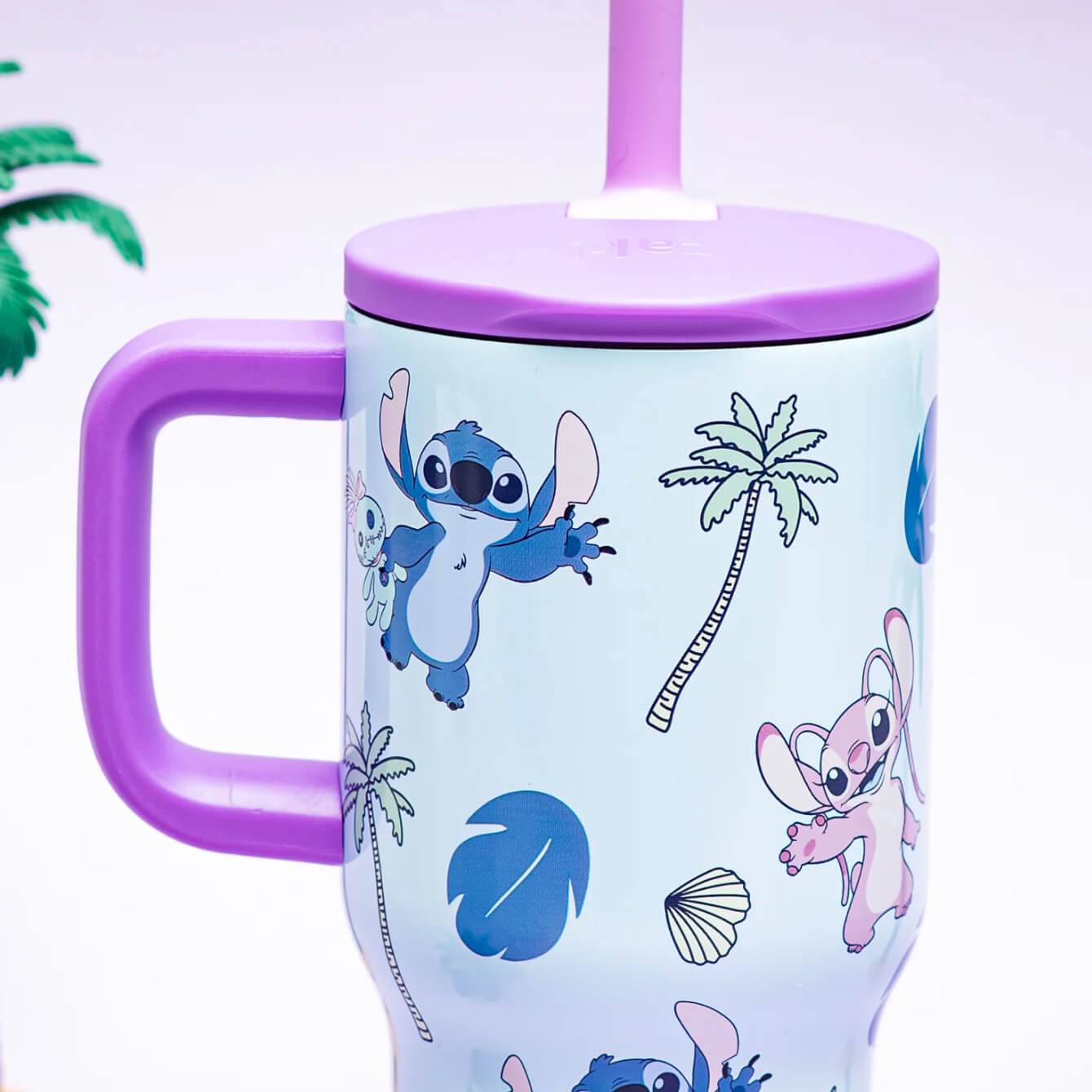 purple and blue kids tumbler with lilo and stich artwork