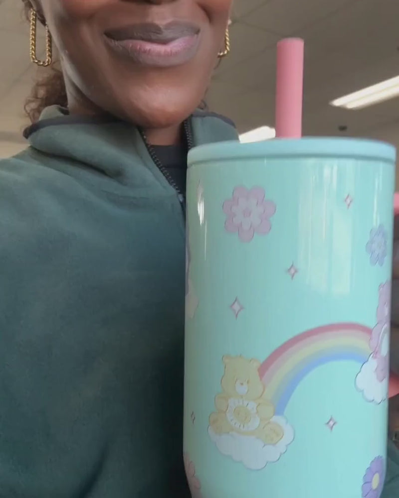 Woman traveling with zak Care Bears straw tumbler
