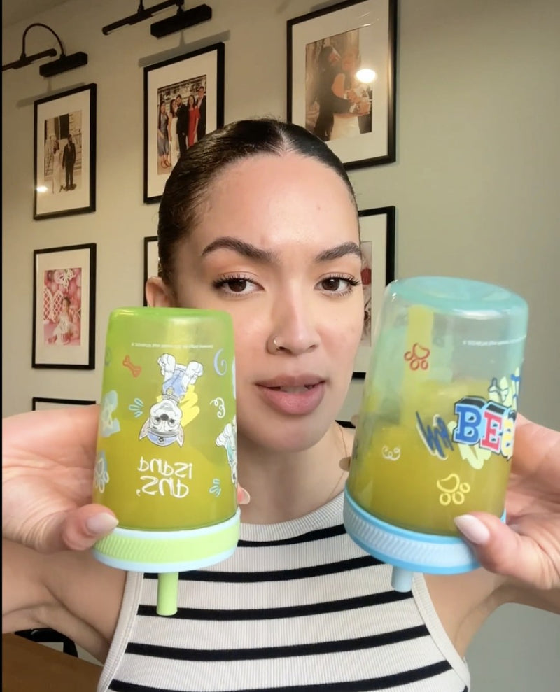 I found a kids' cup that works. No spills!